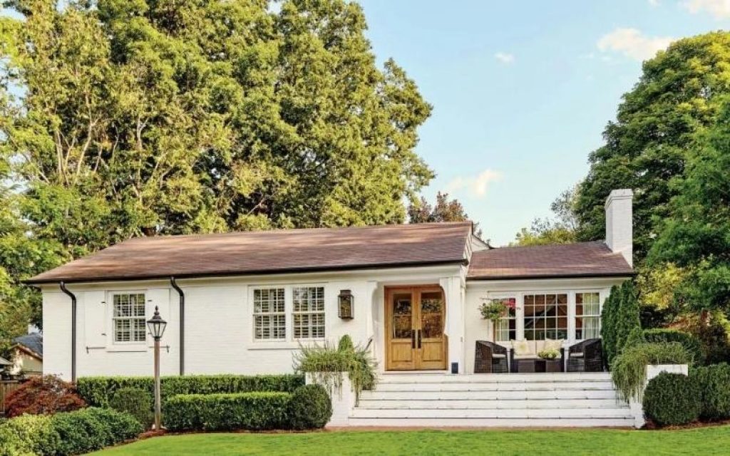 Black Gutters on White Brick House (2)