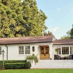 Black Gutters on White Brick House (2)