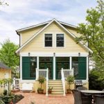 Black Gutters on Yellow House