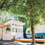 revamped vintage Shasta trailer that serves as an additional tiny house room