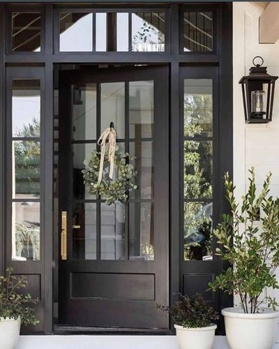 Black Farmhouse Front Door With Glass Between Black Sconces