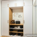 Top 4 Smart Storage Solutions for Tight Areas - a white closet with a shoe rack and a handbag